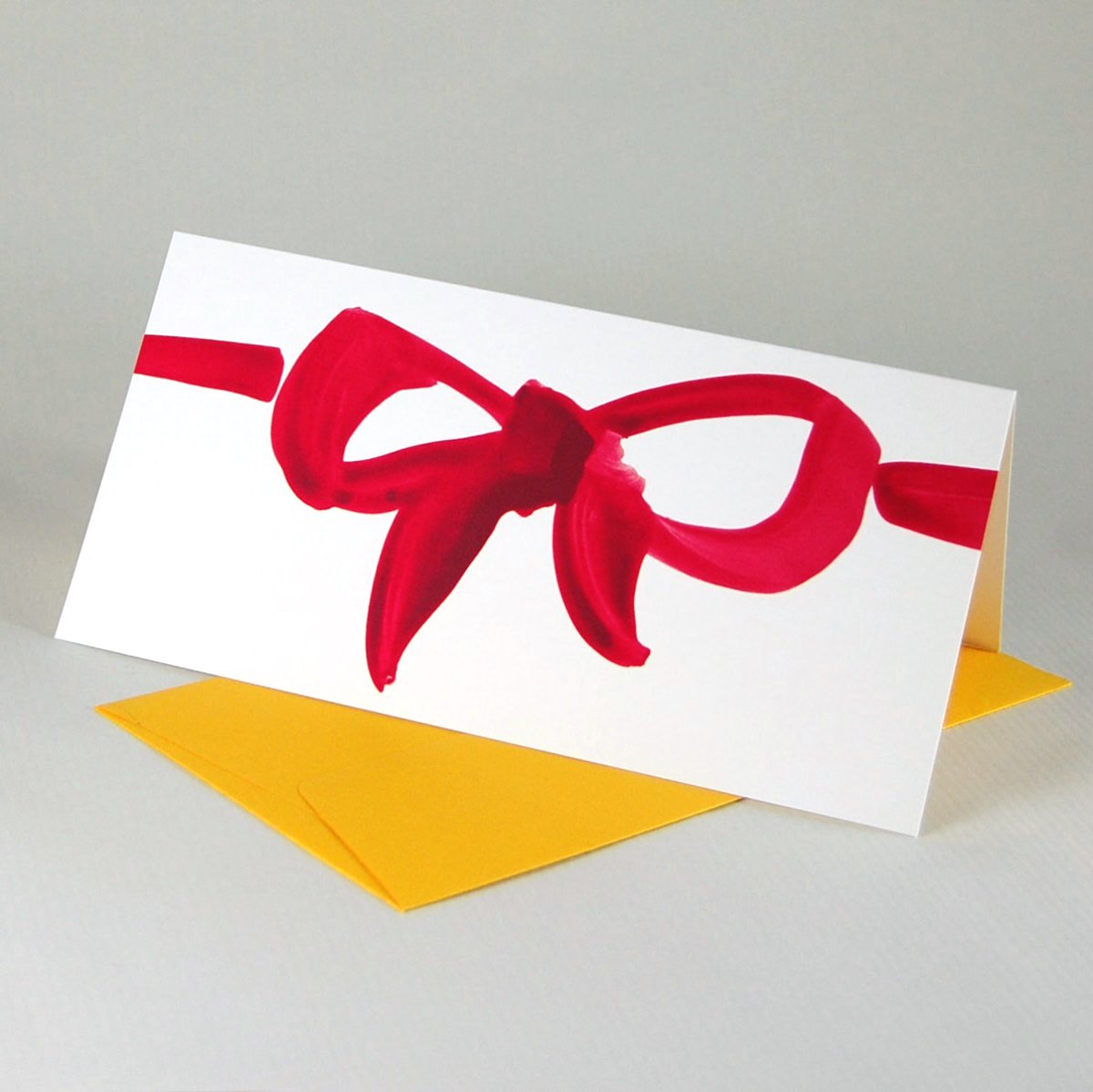 rote Schleife, Karten mit farbigen Umschlägen für Gutscheine, Geschenke und Überraschungen