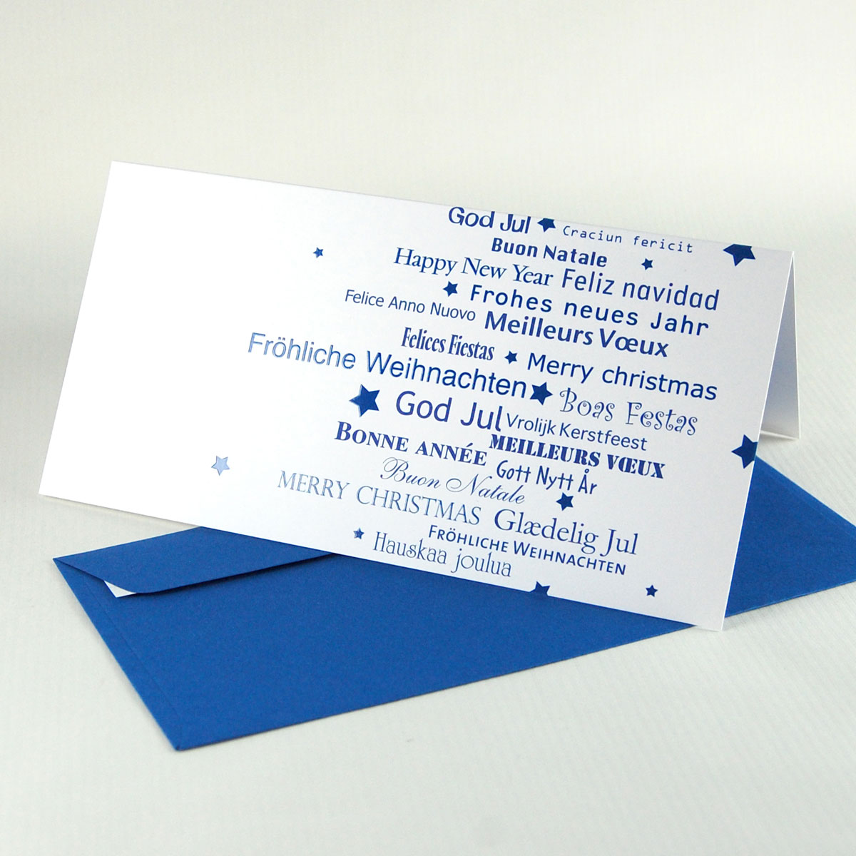 Fröhliche Weihnachten, Felices Fiestas, Craciun fericit - mehrsprachige Weihnachtskarten, blau gedruckt mit blauen Kuverts