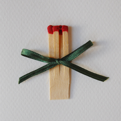 Design-Weihnachtskarten mit vier Streichh&ouml;lzern