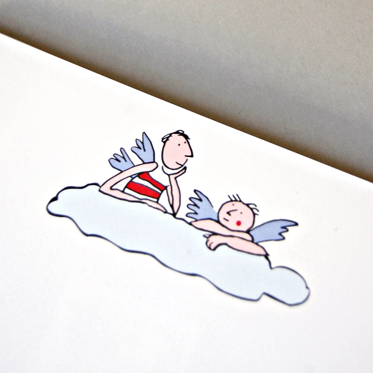 illustriertes Weihnachtspapier mit zwei Engelchen