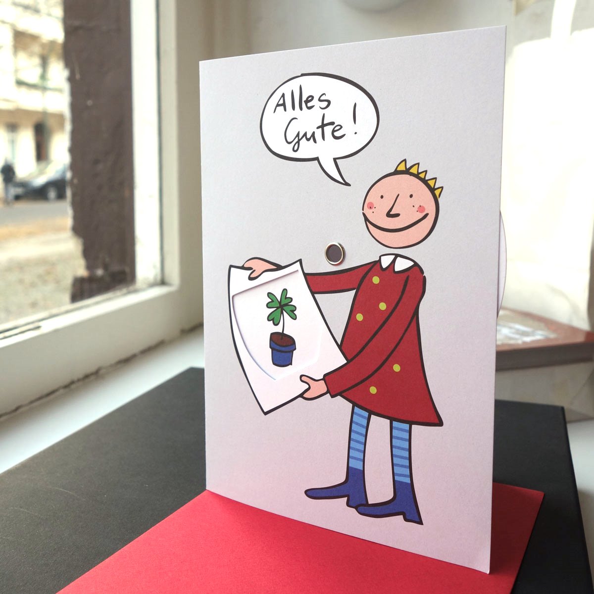 Glückwunschkarten-Parkuhr: Durch Drehen wählt man das passende Geschenk