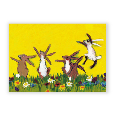 Osterkarten mit glücklich springenden Hasen auf einer Frühlingswiese