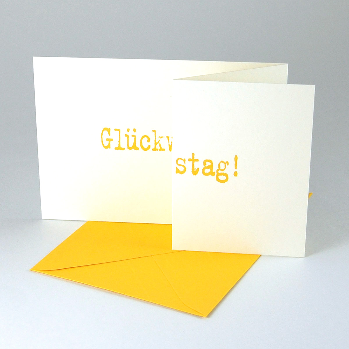 Designer-Glückwunschkarten mit orangen Umschlägen: Glückstag!