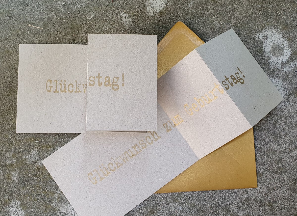 Design-Glückwunschkarten mit gold Kuverts: Glückstag!