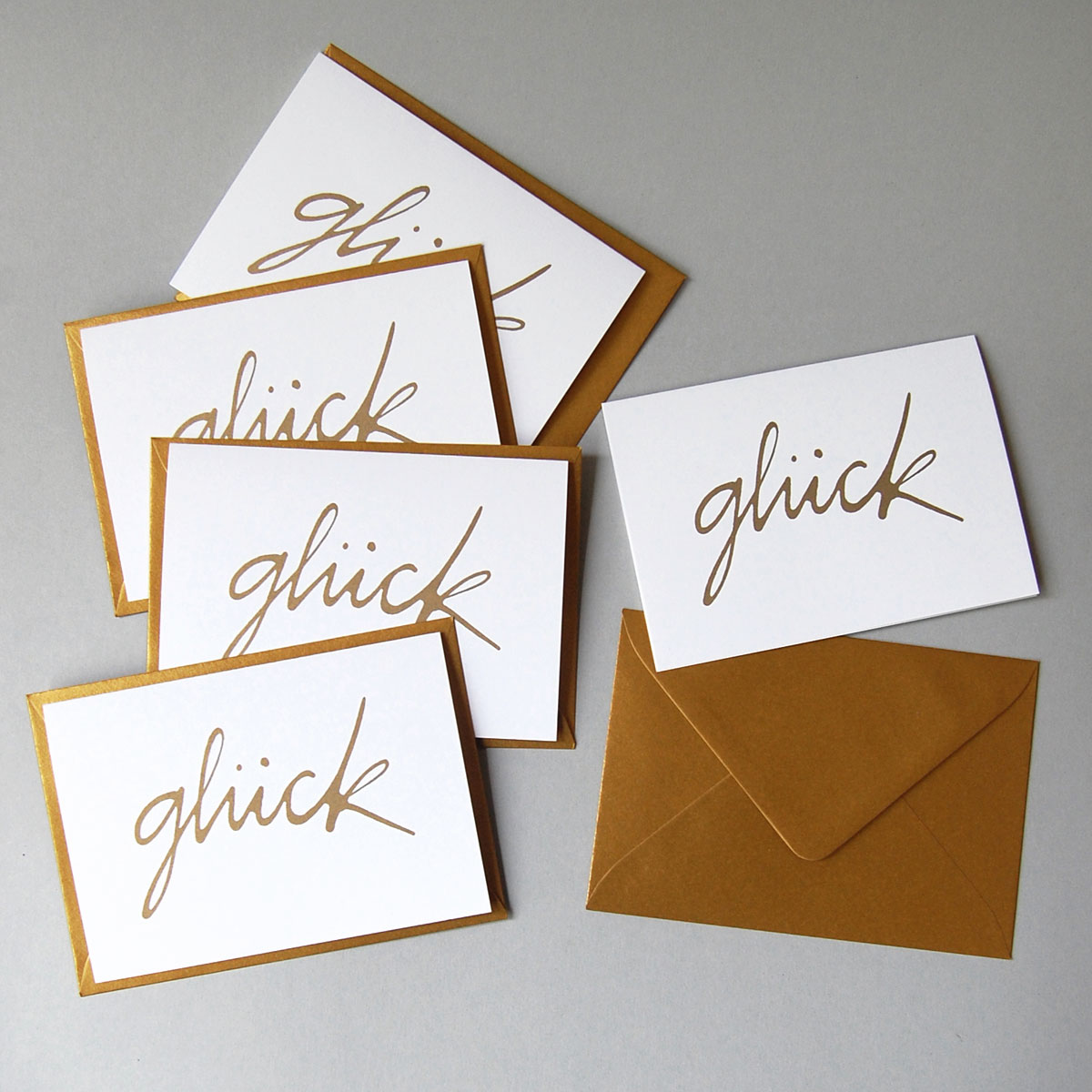 glück, einfache Glückwunschkarten mit goldenen Umschlägen