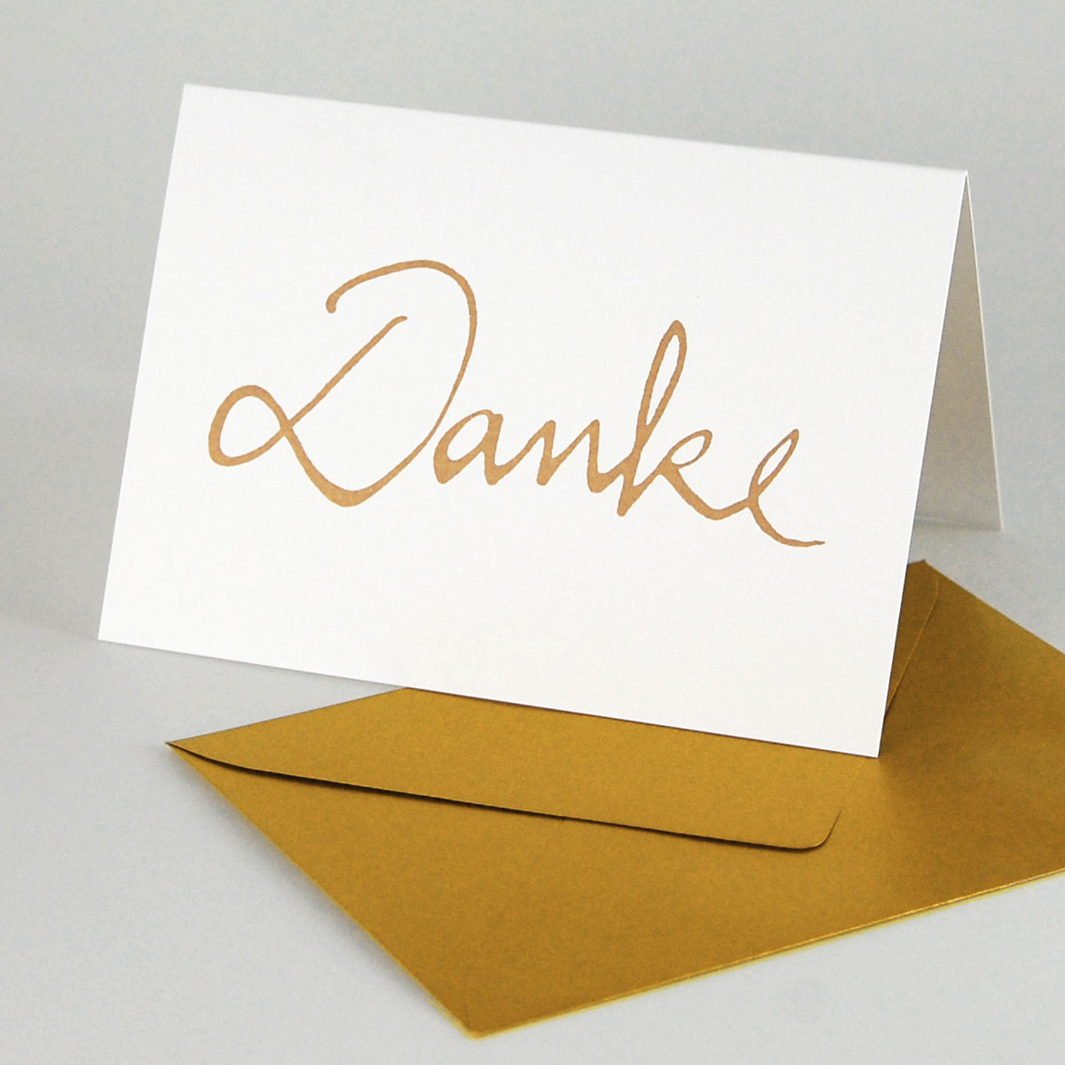 Danke, Klappkarten mit goldenem Schriftzug und goldenem Umschlägen