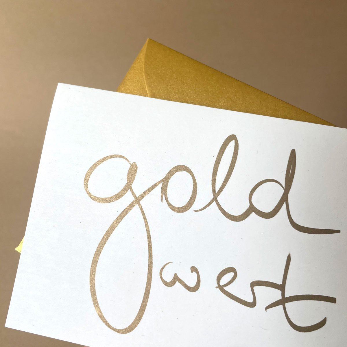 Klappkarten mit goldenen Umschl&auml;gen