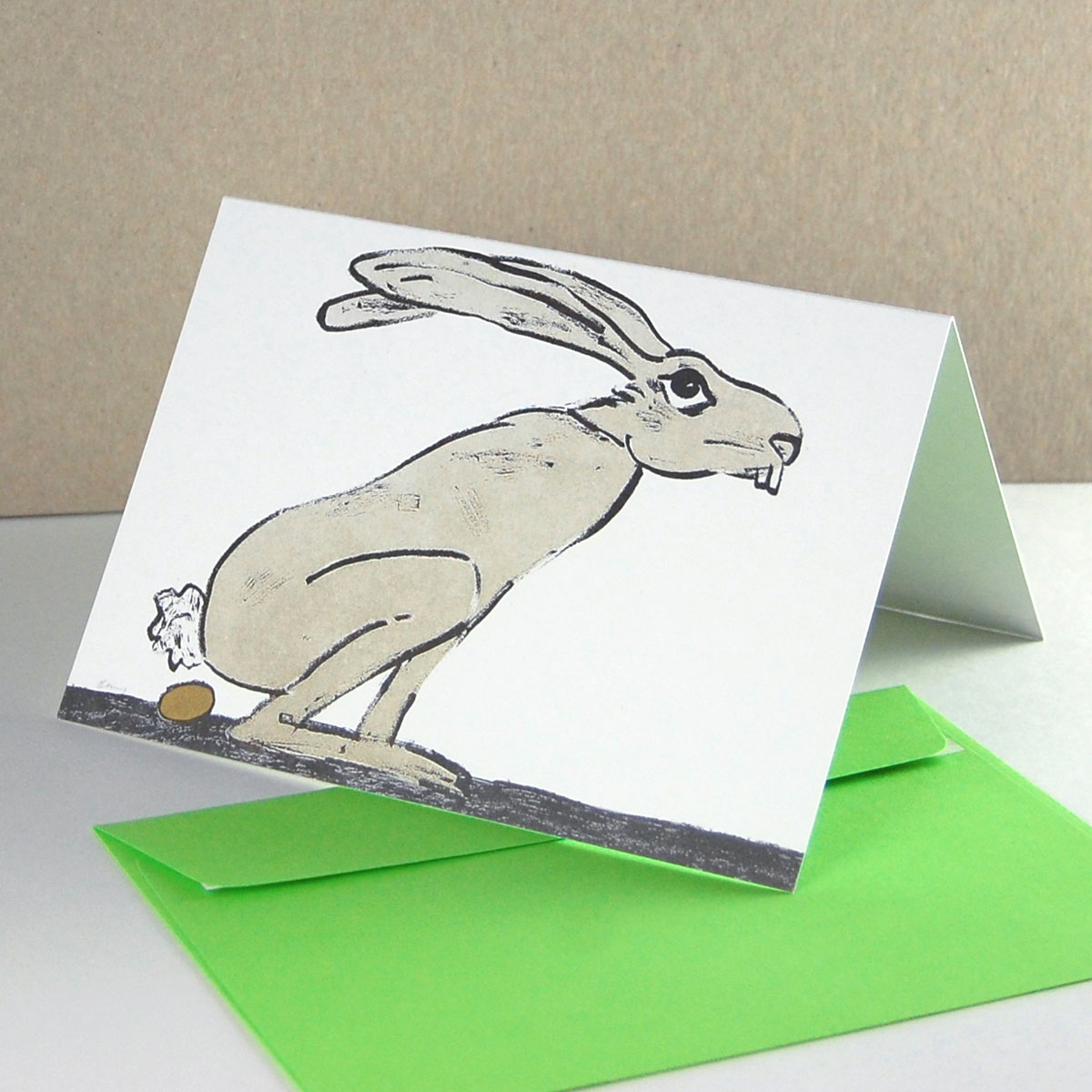 Osterhase legt ein Ei, künstlerische Osterkarten edel mit goldenen Umschlägen