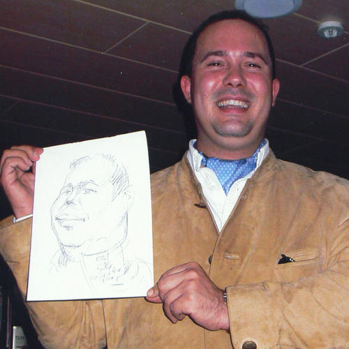 Fotografie eines Mannes mit seiner Karikatur
