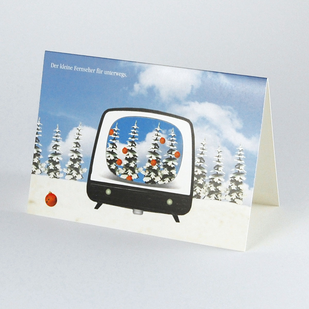 witzige Weihnachtskarten für Nostalgiker: Der kleine Fernseher für unterwegs