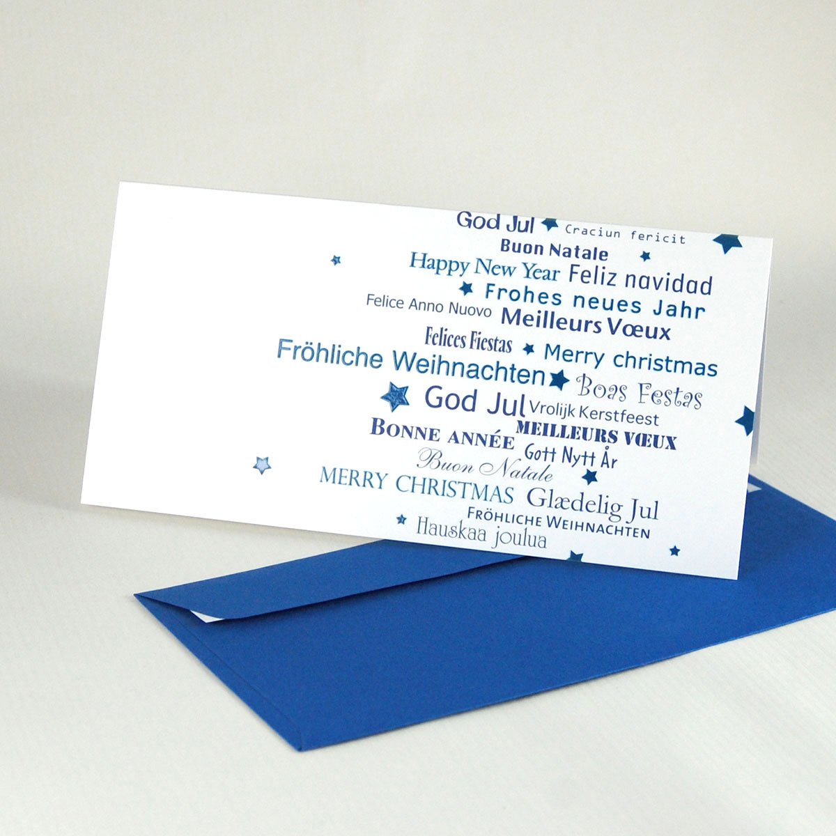 Fröhliche Weihnachten, Felices Fiestas, Craciun fericit - mehrsprachige Weihnachtskarten, blau gedruckt mit blauen Kuverts