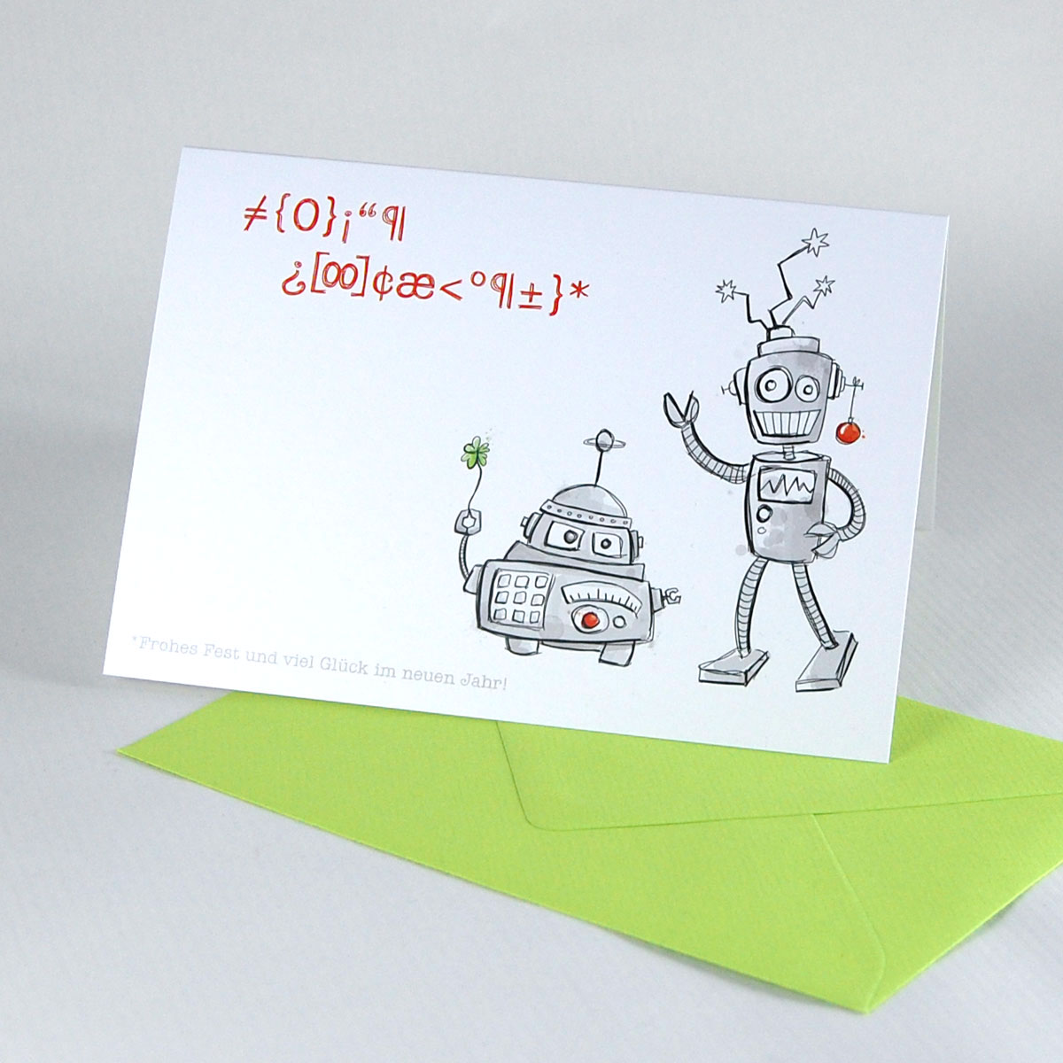 Weihnachtskarten mit hellgrünen Umschlägen und sympathischen Weihnachtsrobotern