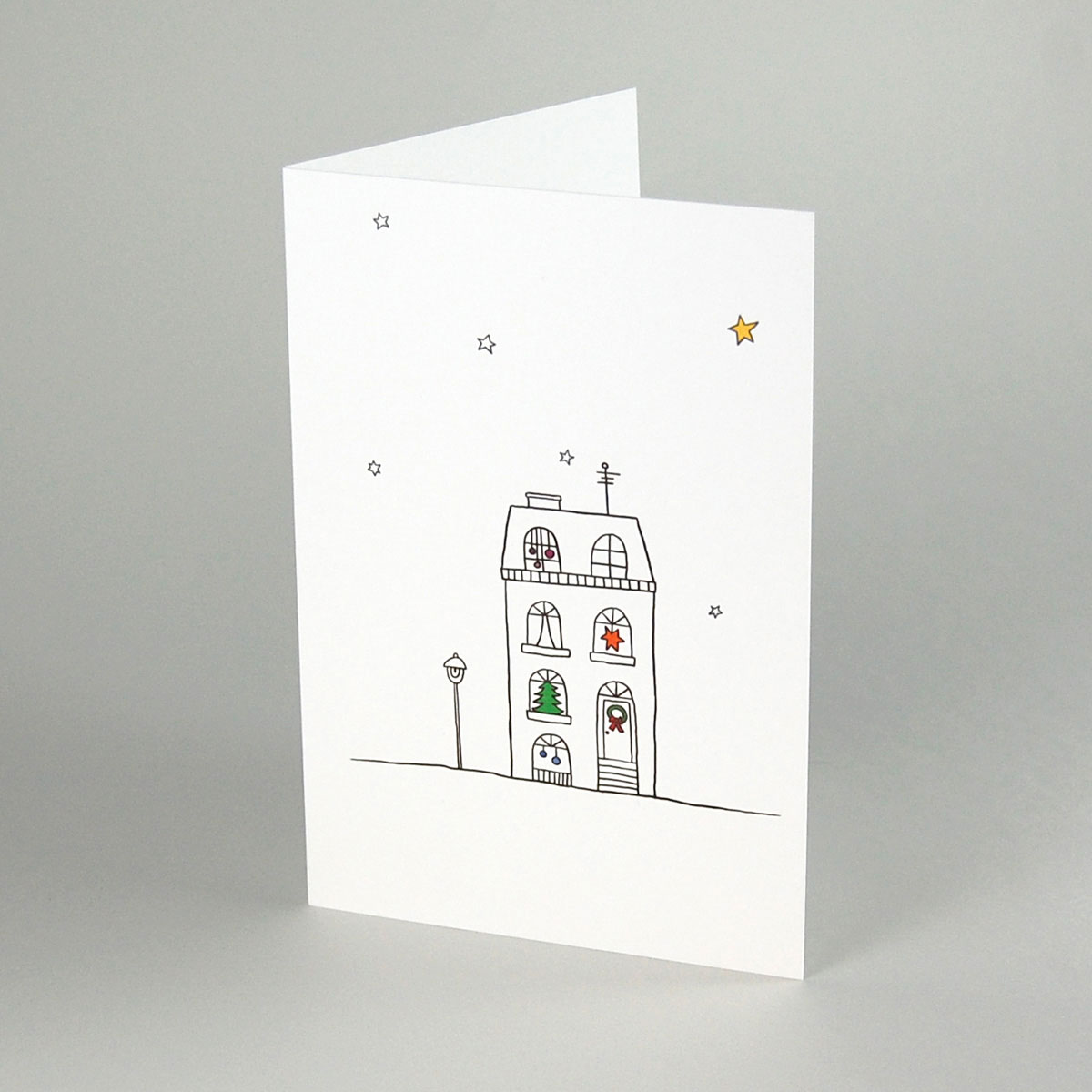 Weihnachtskarten für Architekten, weihnachtliches Haus mit Straßenlaterne