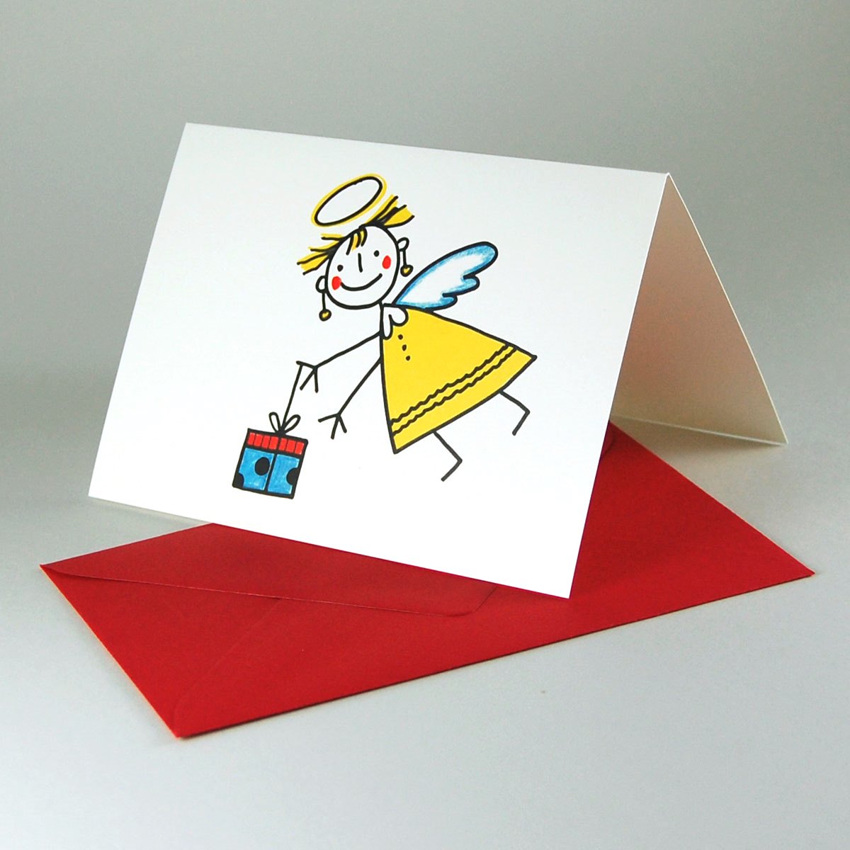 Christkind mit Geschenk, verschicken Sie witzige Weihnachtskarten mit farbigen Umschlägen