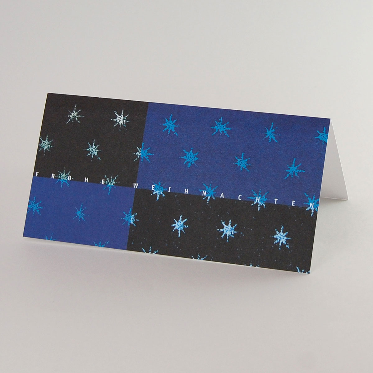 Weihnachtskarte in Blautönen: Frohe Weihnachten