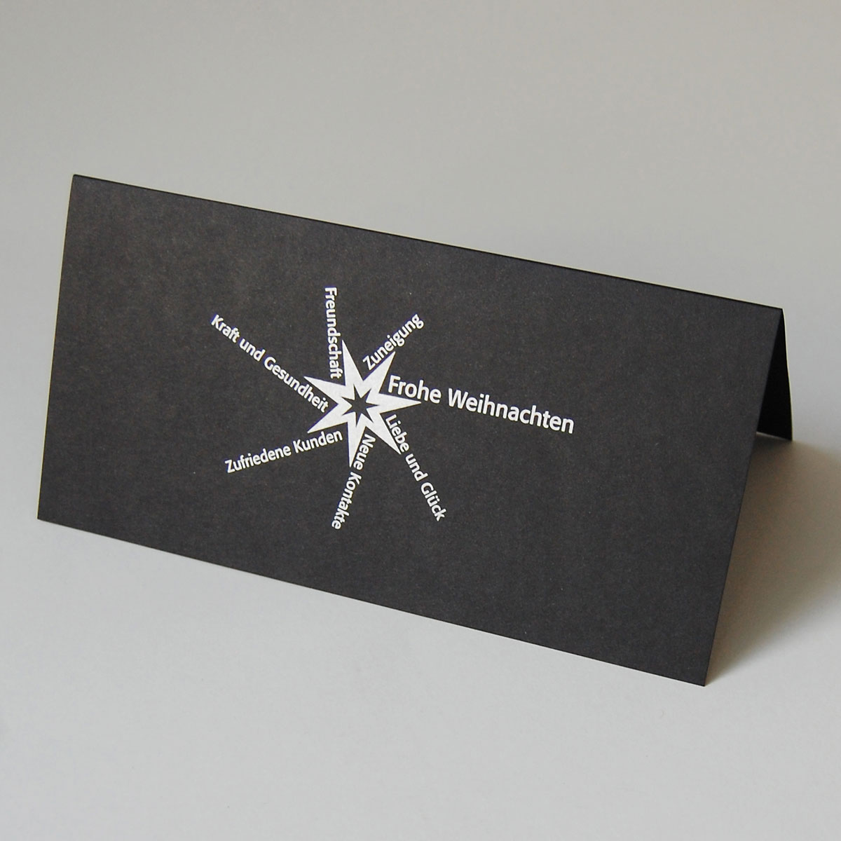 Grüße und Wünsche - schwarzer Karton mit silbernem Druck - Firmen-Weihnachtskarten