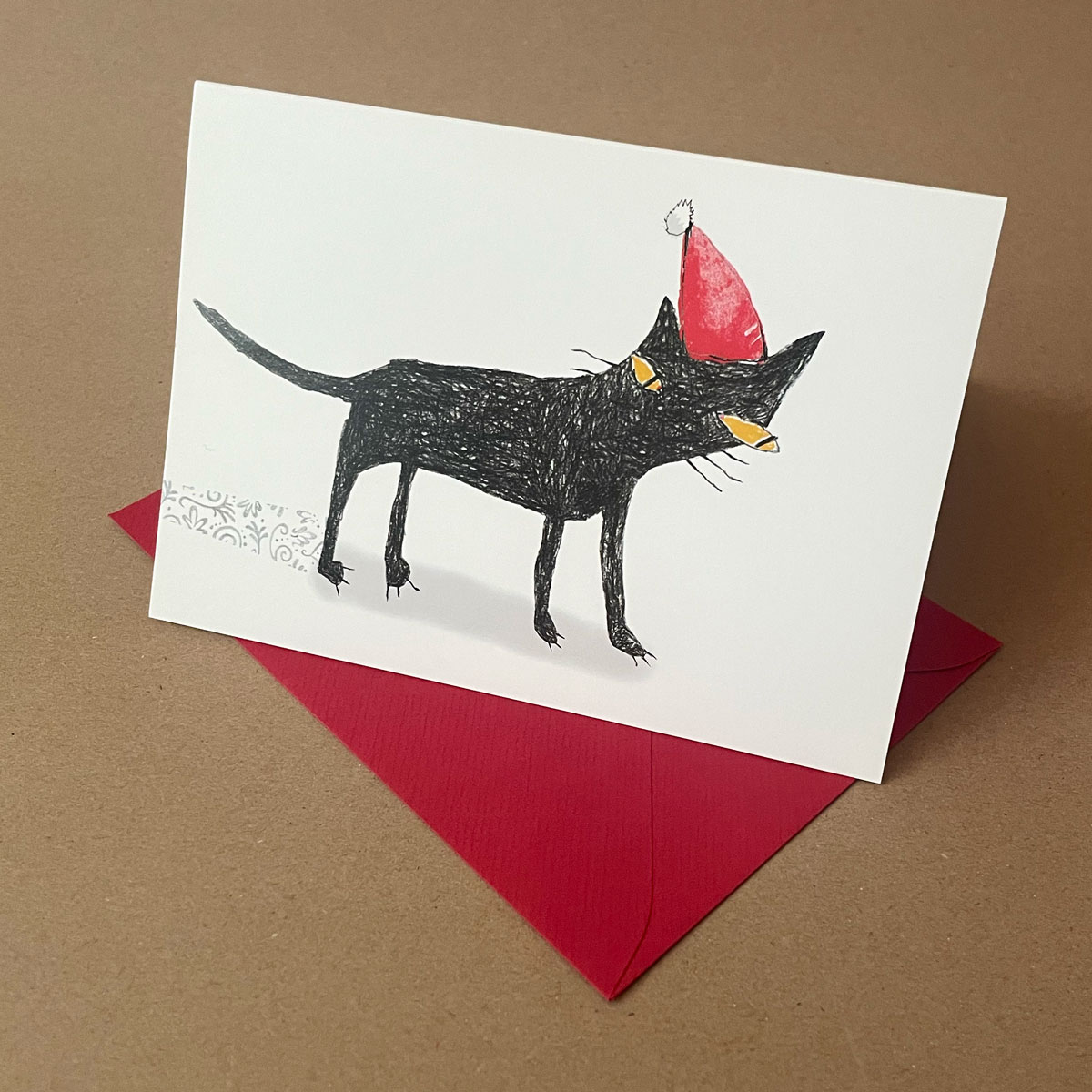 Weihnachtskarten mit schwarzem Kater und mit roten Umschlägen