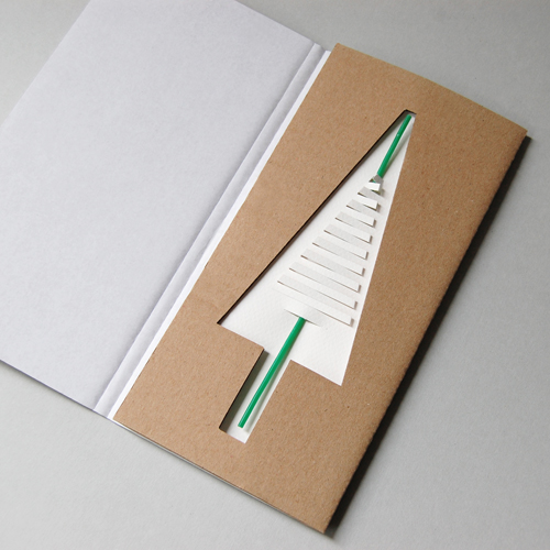 Design-Weihnachtskarte mit superdünner Kerze und passender Verpackung