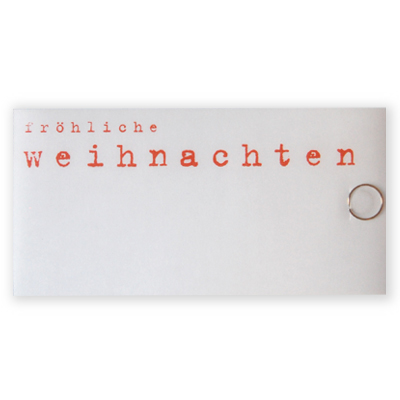 fröhliche weihnachten, orange gedruckte Design-Weihnachtskarten mit Büroklammer