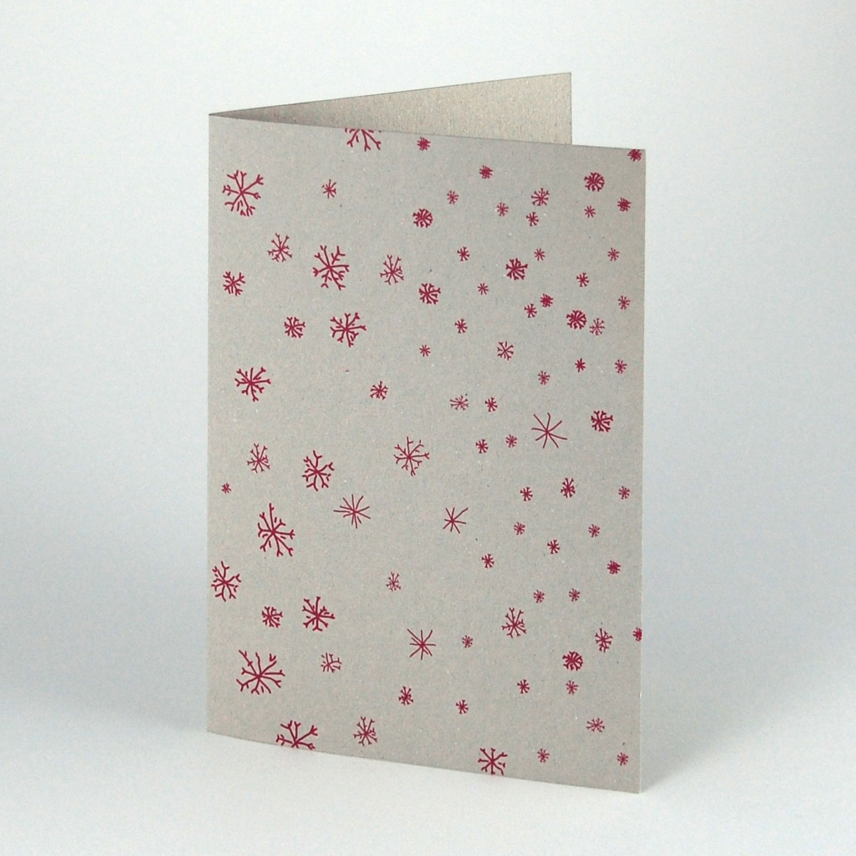 Schneeflocken, umweltfreundliche Weihnachtskarten in reduziertem Design