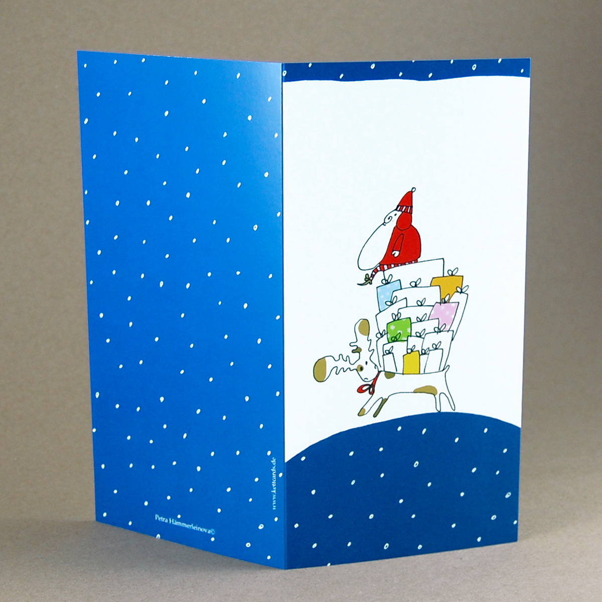 Weihnachtskarte mit reitendem Weihnachtsmannn