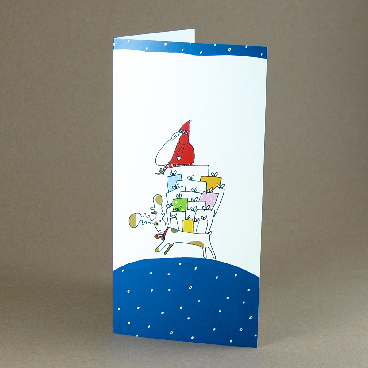 witzige Weihnachtskarten mit reitendem Weihnachtsmannn auf einem riesigen Geschenkehaufen