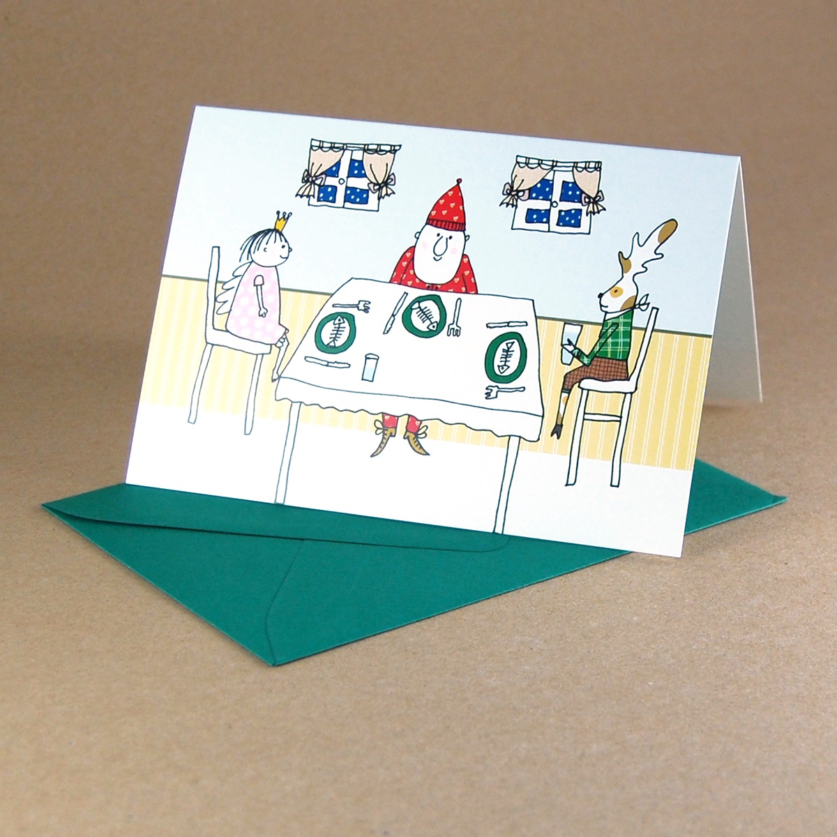 Weihnachtskarten mit dunkelgrünen Umschlägen