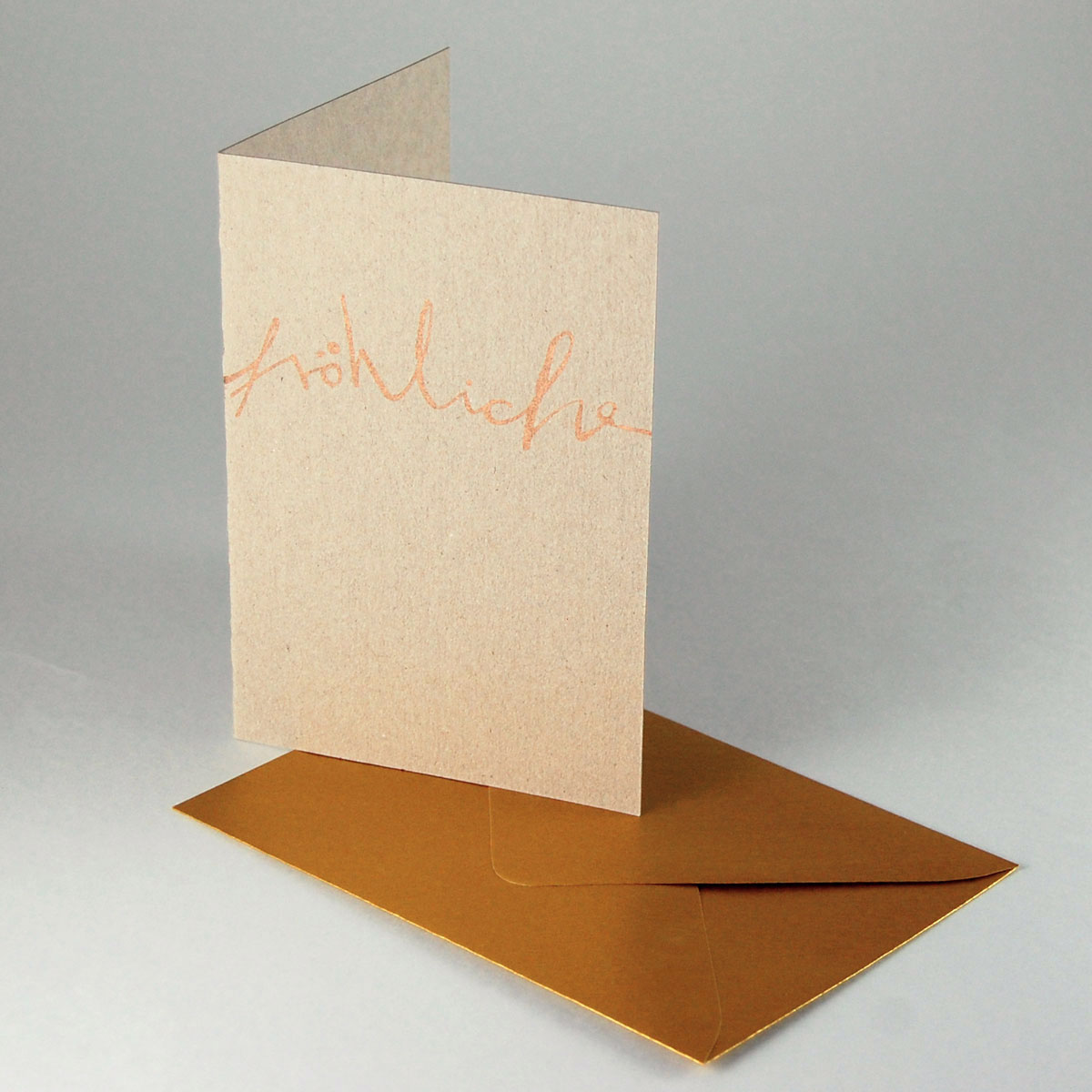 Recycling-Weihnachtskarten aus billiger Graupappe mit edlen, goldenen Umschlägen