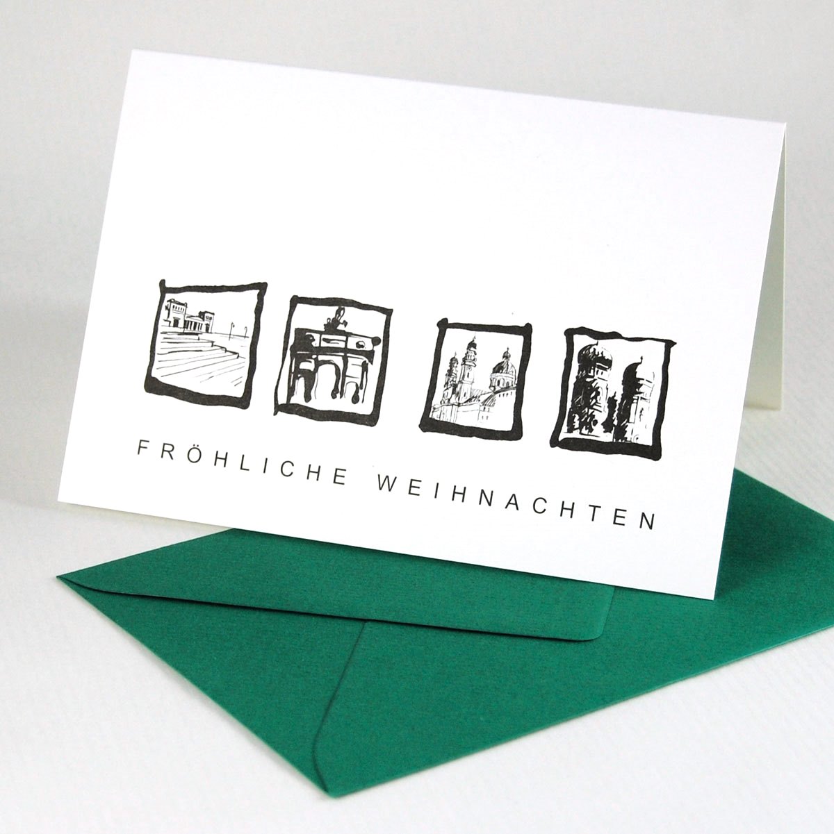 Münchener Weihnachtskarten mit tannengrünen Umschlägen: Propyläen, Siegestor, Theatinerkirche und Frauenkirche