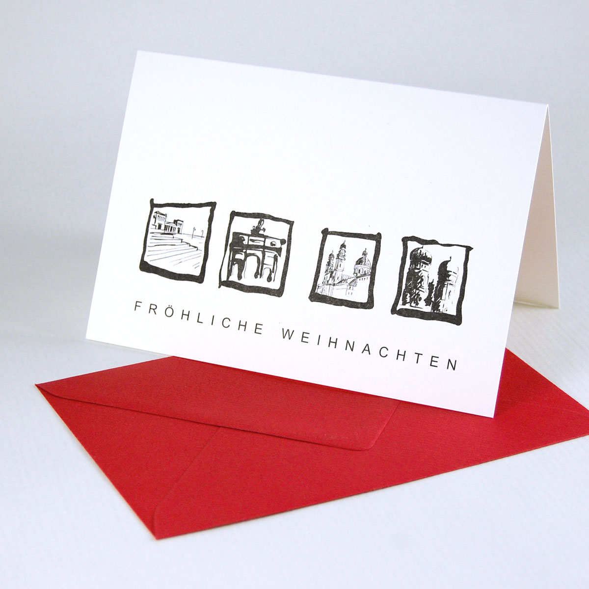Münchener Weihnachtskarten mit roten Umschlägen: Propyläen, Siegestor, Theatinerkirche und Frauenkirche