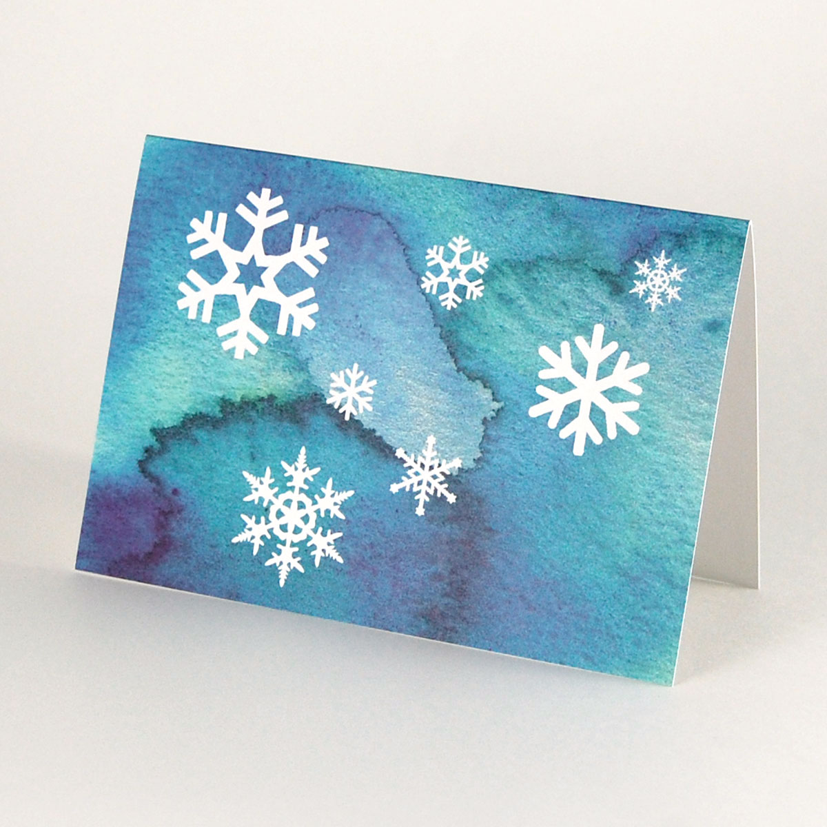 Schneeflocken, Recycling-Weihnachtskarten in Blautönen