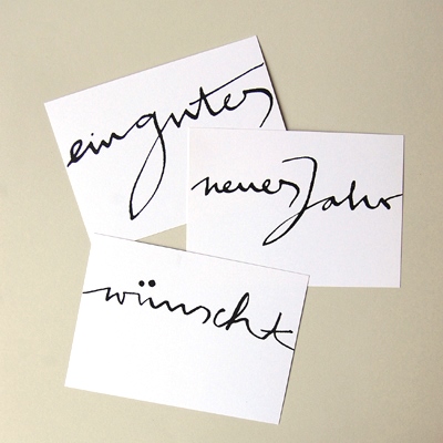 ein gutes neues Jahr wünscht, drei einzelne Neujahrspostkarten mit schwungvollem Schriftzug