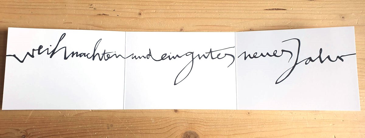 fröhliche weihnachten und ein gutes neues Jahr, Karte für Weihnachten und Neujahr mit schwungvollem Schriftzug
