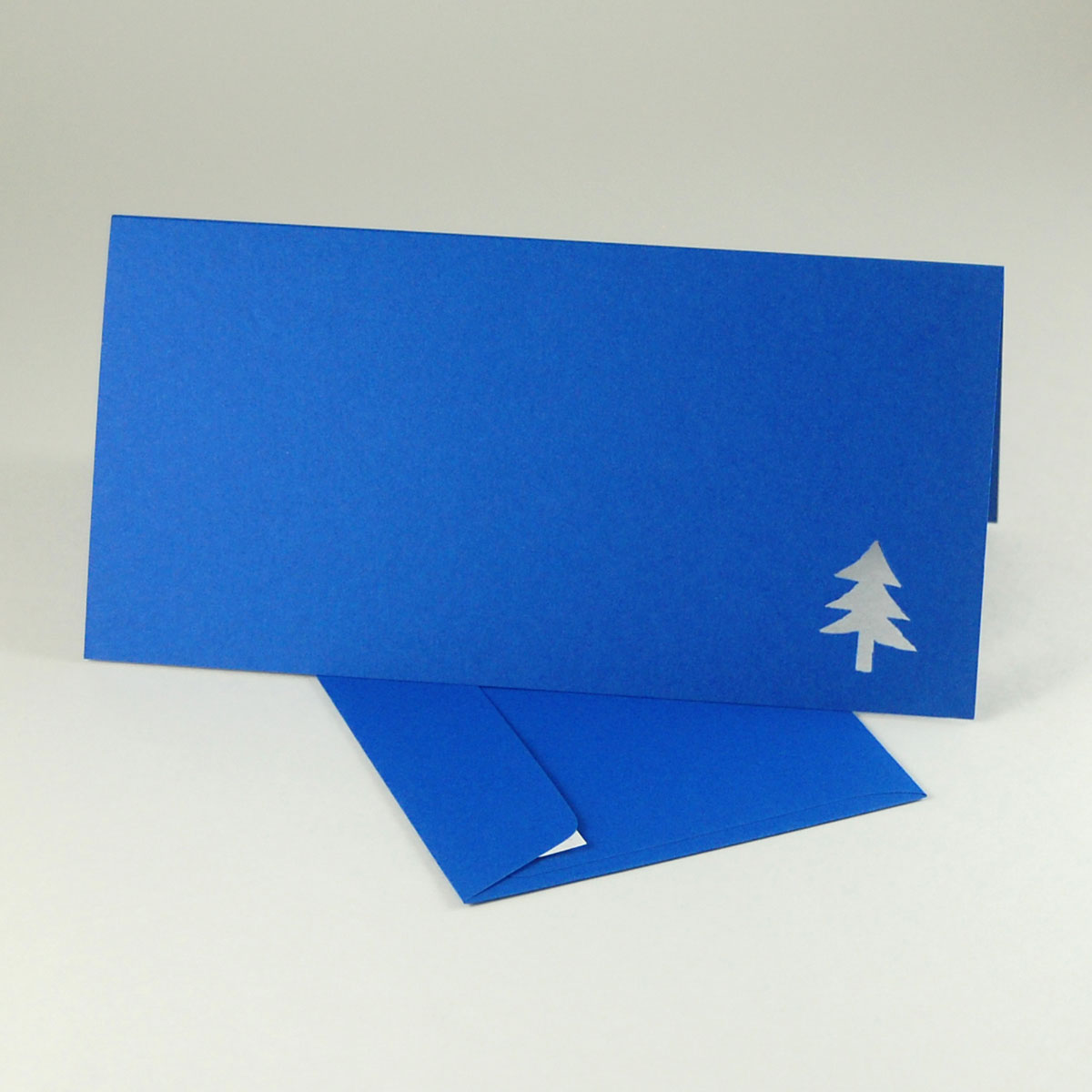 blaue Weihnachtskarte mit blauen Umschlägen