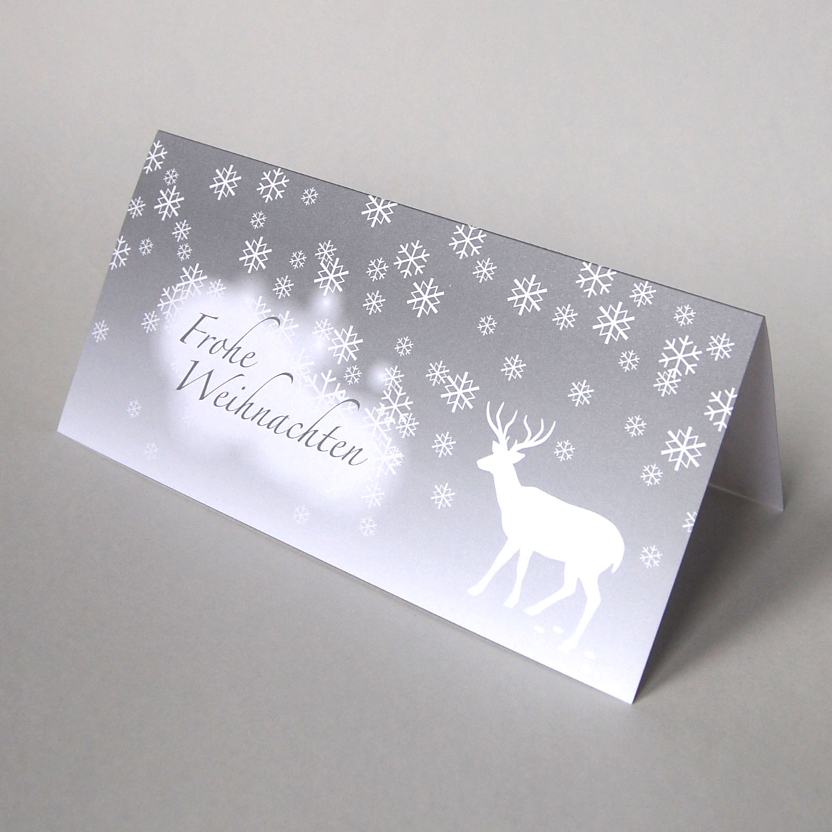 reduzierte Weihnachtskarten, Frohe Weihnachten (Reh mit Geweih im Wald), grauer Druck auf schimmerndem Karton