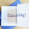 Glückstag, Glückwunschkarten mit lila Druck