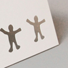 Recycling-Glückwunschkarten mit fünf ausgestanzten Figuren