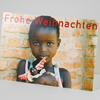 Mädchen mit Puppe, Spendenkarten für Weihnachten