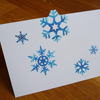 Schneeflocken, Weihnachtskarten mit Stanzung