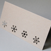 Öko-Weihnachtskarten mit ausgestanzten Schneeflocken
