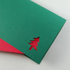 dunkelgrüne Weihnachtskarten mit ausgestanztem Tannenbaum